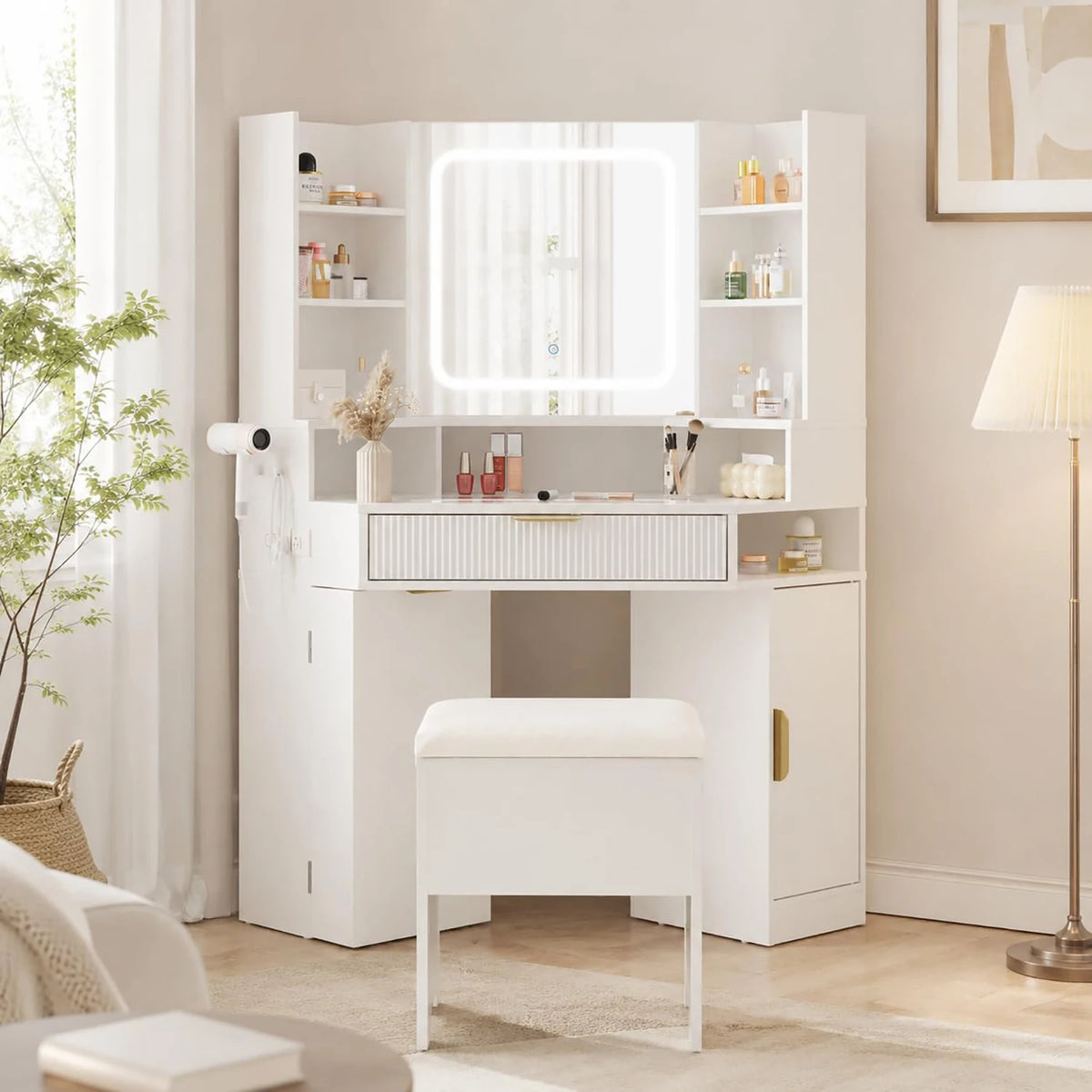 Corner vanity features a lighted mirror, glass top, charging station, and drawers.