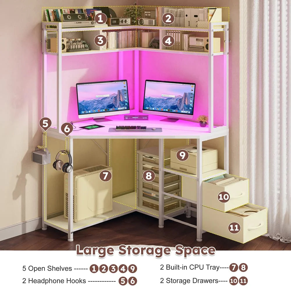 Corner gaming desk includes outlets, LED lights, drawers, shelves, hooks.