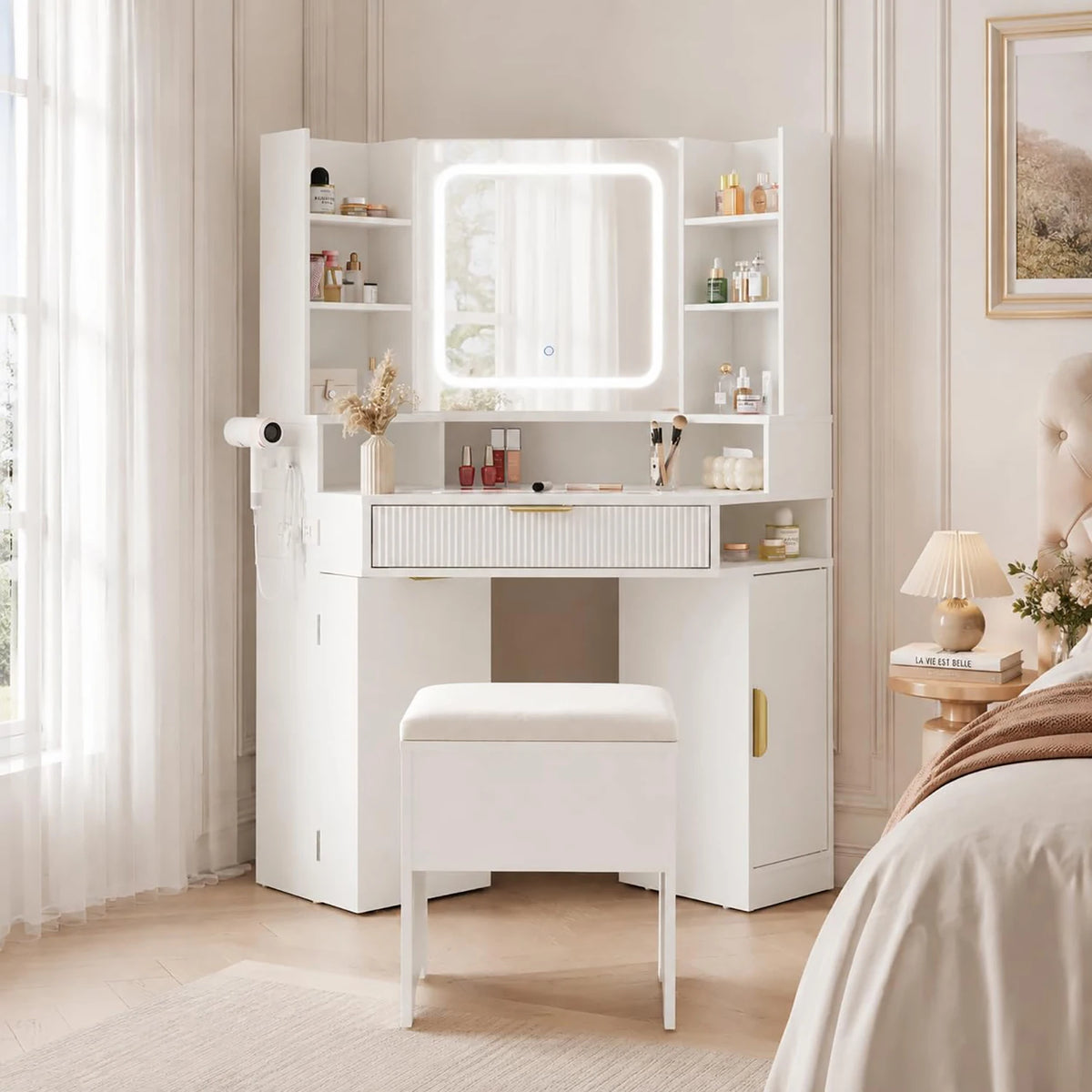 Corner vanity features a lighted mirror, glass top, charging station, and drawers.