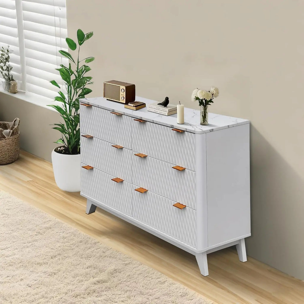 Modern fluted dresser offers six drawers, faux marble top, and versatile storage